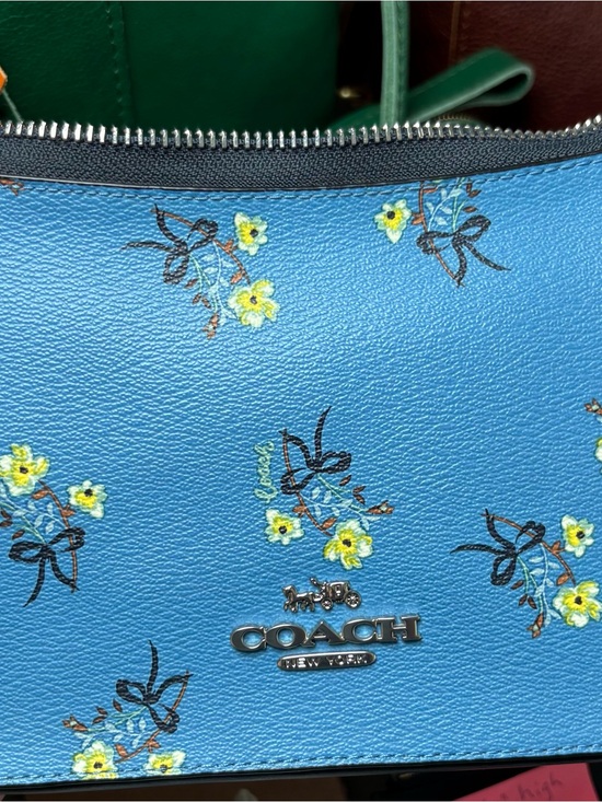 Coach Handbags - Coach Jes Baguette Floral Leather Crossbody Bag.